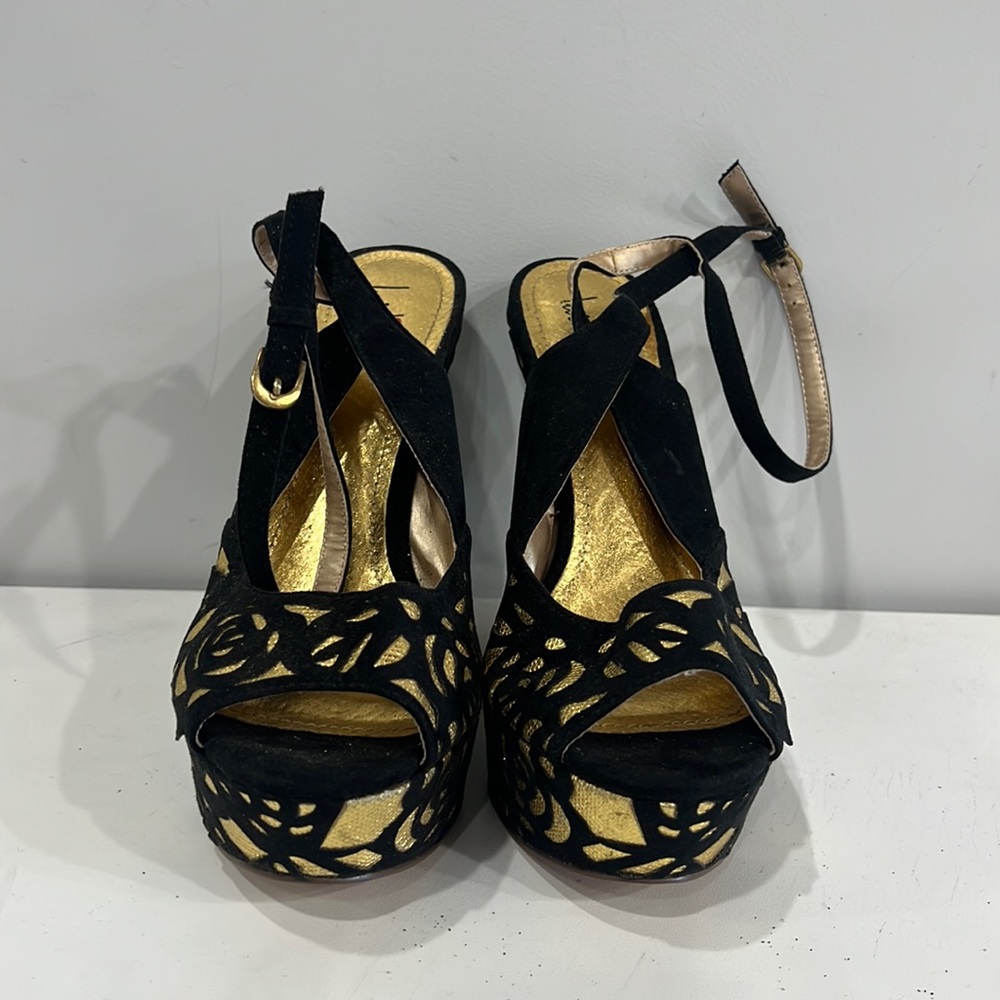 Luichiny Faux Suede Black & Gold High Wedge Platform Sandal. Heel height 5.5 in.